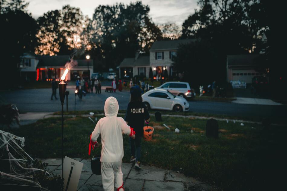 A group of children going trick-or-treating for Halloween.