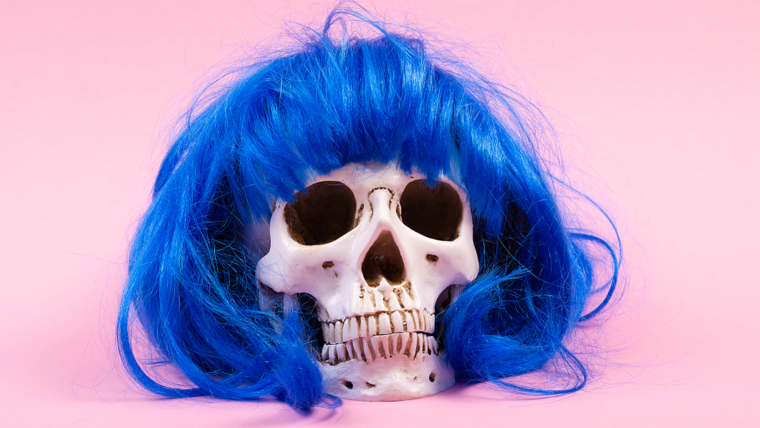 a custom wig, blue on a skeleton